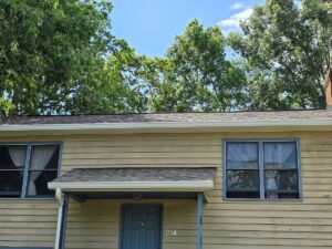 Replaced damaged soffit with white vented and fascia with aluminum wrapped boards