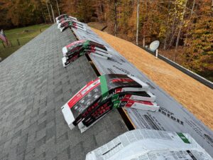 Roofing installation in progress in Ruther Glen, VA showing Epilay synthetic underlayment and bundles of TAMKO Titan XT shingles ready for installation