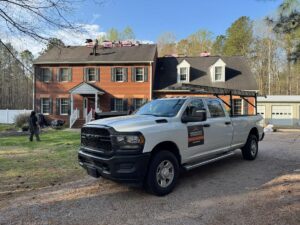 Old, weathered roof on a home in Mechanicsville, VA prior to a full replacement by Weathertight Exteriors.